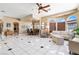 Open living room with large windows and view of the dining room at 4545 W Agate Ave, Las Vegas, NV 89139