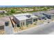 Aerial view of a modern home featuring clean lines, a flat roof, and a stone facade detail at 4750 Outlook Peak St, Las Vegas, NV 89135