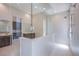 Modern bathroom with glass-enclosed shower and dual sink vanity at 4750 Outlook Peak St, Las Vegas, NV 89135