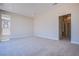 Expansive bedroom with plush carpeting and ample natural light at 4750 Outlook Peak St, Las Vegas, NV 89135