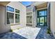Covered front entrance with stone accents and stylish gray pavers at 4750 Outlook Peak St, Las Vegas, NV 89135
