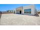 Modern home design featuring clean lines, large windows, and a bright exterior paint color at 4750 Outlook Peak St, Las Vegas, NV 89135
