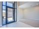 Open foyer with ceramic tile leading to a carpeted living space at 4750 Outlook Peak St, Las Vegas, NV 89135