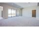 Bright, open living room with large windows and ample natural light at 4750 Outlook Peak St, Las Vegas, NV 89135