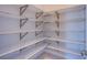 A spacious walk-in pantry with ample shelving for organized storage at 4750 Outlook Peak St, Las Vegas, NV 89135