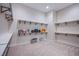 Walk-in closet with ample shelving for organization and storage at 4750 Outlook Peak St, Las Vegas, NV 89135