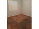 This bedroom with window shutters provides ample natural light and has neutral colored walls at 5004 Wayfaring Tree Ave, Las Vegas, NV 89131