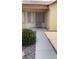 Inviting front porch with security door and walkway at 5004 Wayfaring Tree Ave, Las Vegas, NV 89131