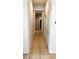 Hallway featuring ceramic tile flooring and doors at 5004 Wayfaring Tree Ave, Las Vegas, NV 89131