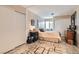 This bedroom showcases two closets and a guitar next to the bedside table at 5368 Regal Ave, Las Vegas, NV 89146