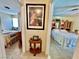 Hallway entrance into two bedrooms with warm-toned walls and neutral carpeting at 5368 Regal Ave, Las Vegas, NV 89146