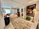 This expansive bedroom has a queen-size bed and eye-catching modern art prints at 5368 Regal Ave, Las Vegas, NV 89146
