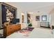 An interior bedroom shot includes furniture, decorations, and posters on the wall at 5368 Regal Ave, Las Vegas, NV 89146
