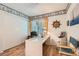 The airy home office has nautical decor, perfect for creating a seaside ambiance at 5368 Regal Ave, Las Vegas, NV 89146