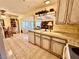 Bright kitchen featuring granite countertops, stainless appliances, and easy access to dining and living areas at 5368 Regal Ave, Las Vegas, NV 89146