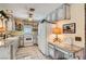 Charming kitchen with custom cabinetry, modern appliances, and unique decorative touches at 5368 Regal Ave, Las Vegas, NV 89146