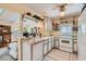 Bright kitchen featuring updated appliances, elegant countertops, and easy access to living spaces at 5368 Regal Ave, Las Vegas, NV 89146