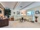 Spacious living room featuring a sectional sofa, cozy decor, and abundant natural light at 5368 Regal Ave, Las Vegas, NV 89146