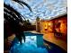 The backyard features a pool with the home in the background at 5368 Regal Ave, Las Vegas, NV 89146