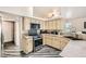 Well-equipped kitchen with stainless steel appliances, granite countertops, and lots of cabinet space at 5489 Royal Vista Ln, Las Vegas, NV 89149
