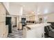 Well-lit kitchen features ample cabinet space, modern appliances, and an open design to the living areas at 5489 Royal Vista Ln, Las Vegas, NV 89149