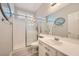 Well-lit bathroom featuring a glass-enclosed shower and modern fixtures at 6103 Sundown Crest St, Las Vegas, NV 89113