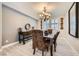 Elegant dining room with modern chandelier, and luxury decor at 6103 Sundown Crest St, Las Vegas, NV 89113