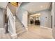 Welcoming entryway showcases a staircase and a view of the formal dining room at 6103 Sundown Crest St, Las Vegas, NV 89113