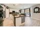 Modern kitchen with stainless steel appliances, granite countertops and white cabinetry at 6103 Sundown Crest St, Las Vegas, NV 89113