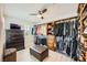 Large walk-in closet with custom shelving, drawers, and ample space for storage, well-lit at 6103 Sundown Crest St, Las Vegas, NV 89113