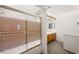 Bathroom featuring a separate shower, toilet, and sink with wood cabinets at 615 Cervantes Dr, Henderson, NV 89014