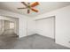 Bedroom featuring ceiling fan, large closet, and neutral carpet at 615 Cervantes Dr, Henderson, NV 89014