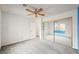 Bright bedroom features mirrored closet doors, blue accent wall and ceiling fan at 615 Cervantes Dr, Henderson, NV 89014