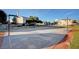 Community basketball court with well-maintained surface, hoops, and surrounding landscaping, providing a recreational space for residents at 6241 Overhang Ave, Henderson, NV 89011