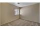Bedroom featuring neutral colored walls, window with blinds and neutral carpet at 6241 Overhang Ave, Henderson, NV 89011