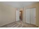 Bedroom has carpet, closet, access to the bathroom and neutral colored walls at 6241 Overhang Ave, Henderson, NV 89011