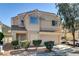 Inviting two-story home featuring a two-car garage and well-maintained landscaping at 6241 Overhang Ave, Henderson, NV 89011