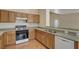Efficient kitchen with modern appliances and ample counter space at 6241 Overhang Ave, Henderson, NV 89011