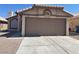 Charming single-story home featuring a two-car garage and low-maintenance desert landscaping at 6340 Cranberry Ln, Las Vegas, NV 89156