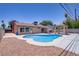 Inviting backyard featuring a private pool, gazebo, and ample space for outdoor enjoyment at 6358 Meadow Lark Ln, Las Vegas, NV 89103