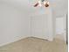 Bedroom with a ceiling fan, closet and neutral paint and carpet at 6358 Meadow Lark Ln, Las Vegas, NV 89103
