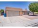 Cozy single-story home with a two-car garage and low-maintenance landscaping at 6358 Meadow Lark Ln, Las Vegas, NV 89103