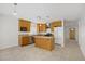Spacious kitchen featuring an island, stainless steel appliances, and tile flooring at 6358 Meadow Lark Ln, Las Vegas, NV 89103