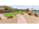 Community amenities offering bocce ball court, comfortable seating, and lush landscaping at 6810 Silver Crescent St, Las Vegas, NV 89148