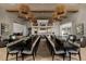 Expansive clubhouse lounge area with modern lighting, stylish decor, and comfortable seating at 6810 Silver Crescent St, Las Vegas, NV 89148