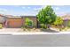 Attractive single-story home boasts a well-maintained front yard and two-car garage at 6810 Silver Crescent St, Las Vegas, NV 89148