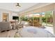 Bright living space features expansive windows and a seamless connection to the outdoor patio area at 6810 Silver Crescent St, Las Vegas, NV 89148