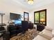 Comfortable office with plush couch and large computer monitor at 6810 Silver Crescent St, Las Vegas, NV 89148