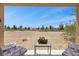 Shaded back patio features a basket and view of open desert at 7817 Homing Pigeon St, North Las Vegas, NV 89084