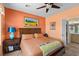 Comfortable bedroom featuring ample natural light and ceiling fan at 7817 Homing Pigeon St, North Las Vegas, NV 89084